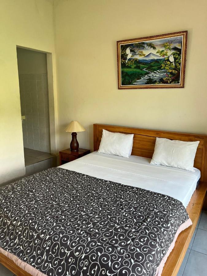 Mesari Homestay & Warung Amed Стая снимка